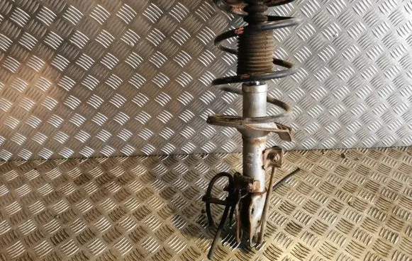 Mitsubishi Lancer X Front shock absorber with coil spring
