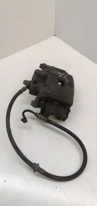 Nissan Juke I F15 Front brake caliper