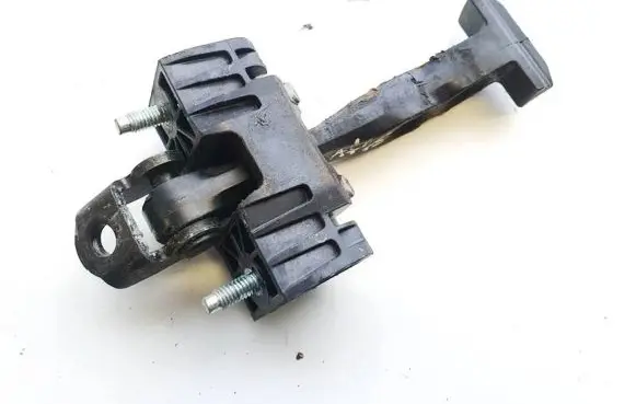 Front door check strap stopper