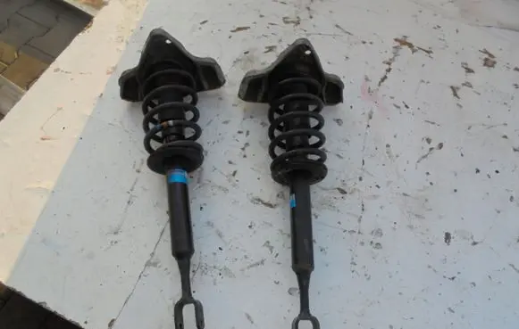 Audi A4 S4 B7 8E 8H Front shock absorber with coil spring MCPERSON