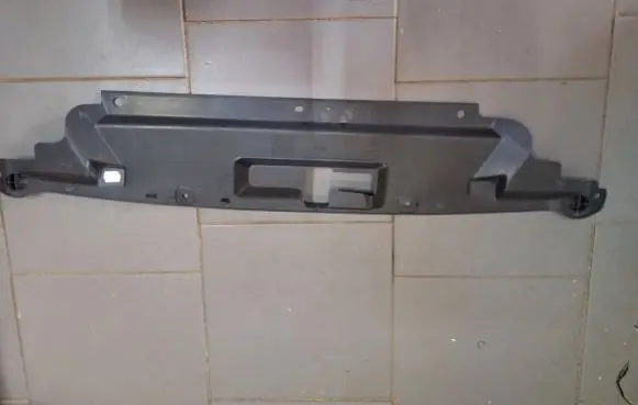 Top upper radiator support slam panel
