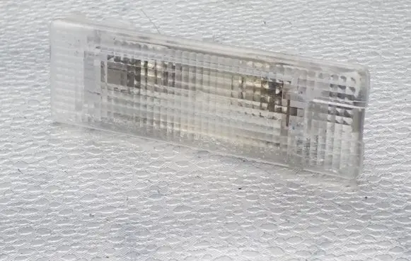Volkswagen Touareg I Glove box light 7L6947101