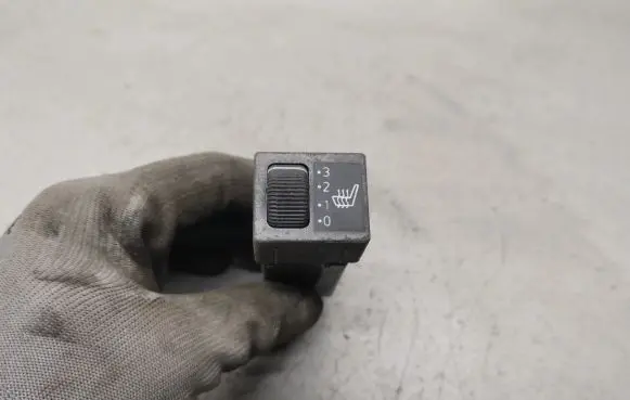 Seat heating switch