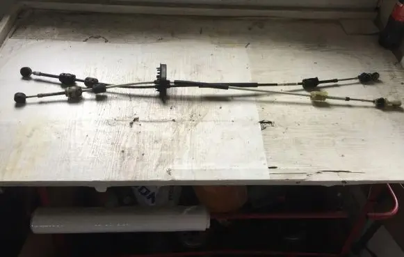 Opel Astra J Gear shift cable linkage
