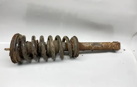 Mitsubishi Pajero Front shock absorber with coil spring