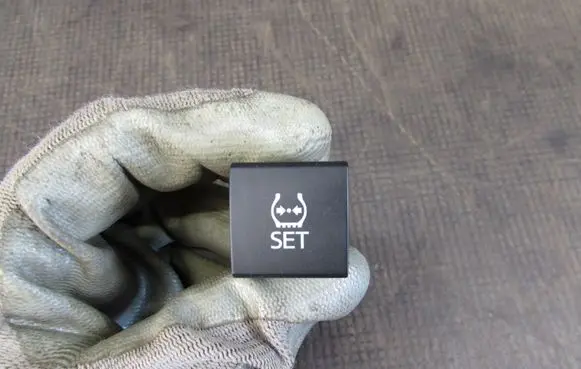 Toyota Corolla E210 E21 TPMS reset button 