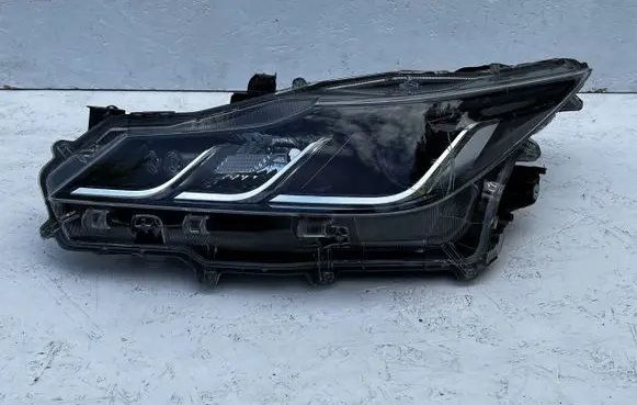 Toyota Corolla E210 E21 Headlight/headlamp 02T31