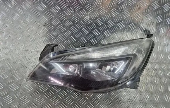 Opel Astra J Headlight/headlamp 13297722 1EG01001107