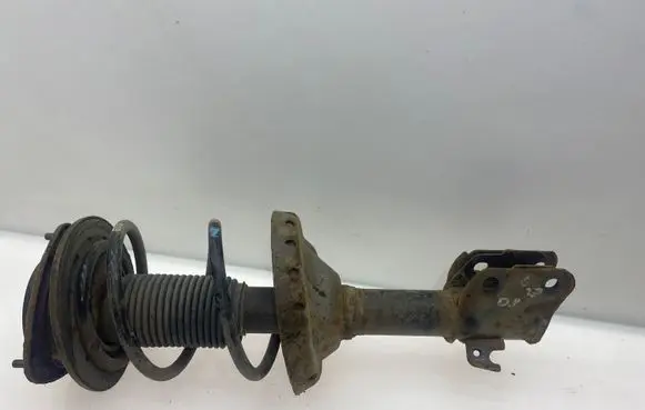 Subaru Legacy Front shock absorber with coil spring