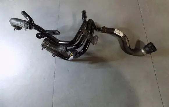 Volkswagen Caddy Engine coolant pipe/hose 04L121064AE