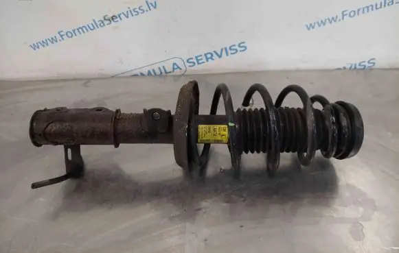 Chevrolet Cruze Front shock absorber with coil spring 13337807