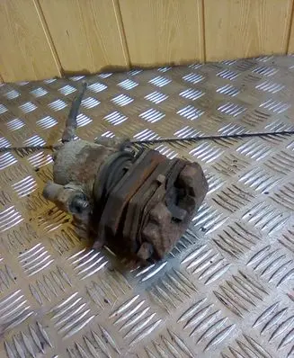 Volkswagen Golf IV Front brake caliper