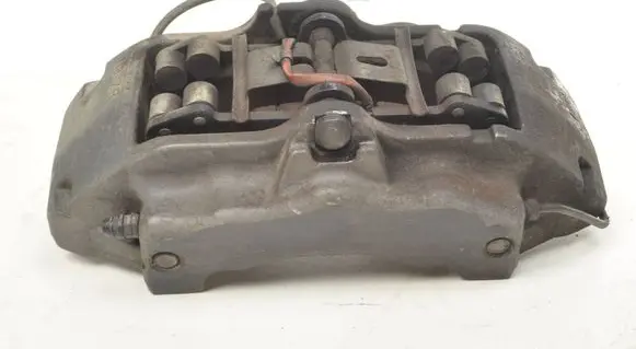 Volkswagen Touareg I Front brake caliper 