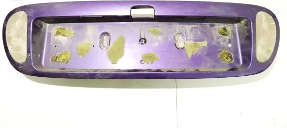 Trunk door license plate light bar