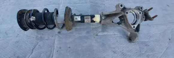 Volkswagen Golf VII Front shock absorber with coil spring 5Q0413031EC