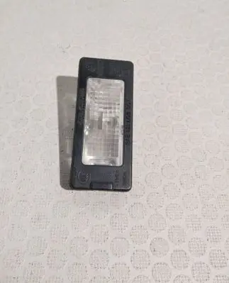 Volkswagen Jetta VI Number plate light 5N0943021