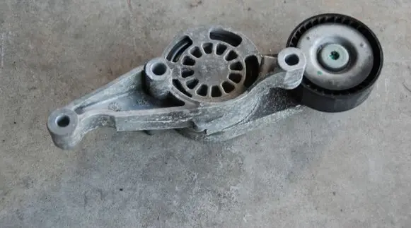 Generator/alternator belt tensioner