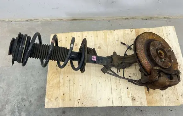 Nissan X-Trail T31 Front shock absorber with coil spring