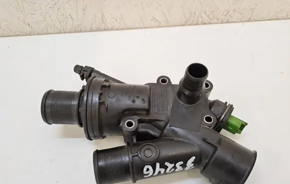 Thermostat/thermostat housing