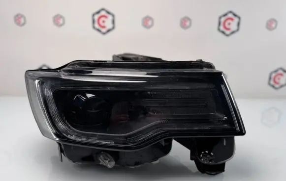 Jeep Grand Cherokee Headlight/headlamp 68266656AG