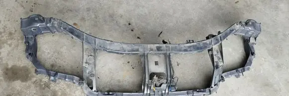 Top upper radiator support slam panel