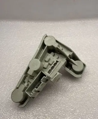 Tail light bulb cover holder