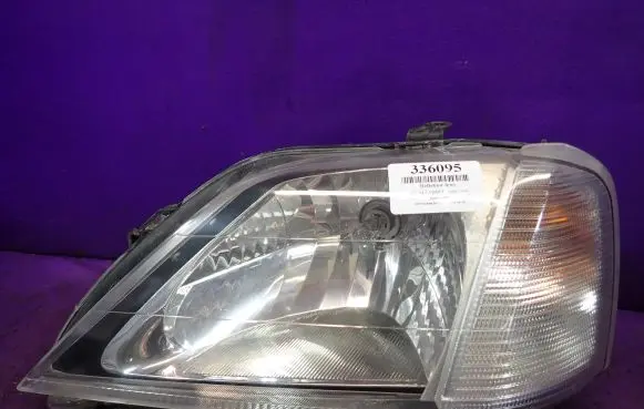 Dacia Logan I Headlight/headlamp 8200211005