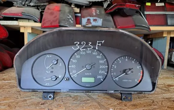 Mazda 323 F Speedometer (instrument cluster) BH1CB 7MBH1CB