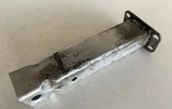 Radiator support slam panel bracket
