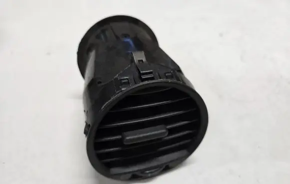 Volkswagen Caddy Dash center air vent grill 2K0819703B