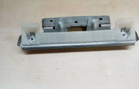 Porsche Cayenne (92A) Front door exterior handle/bracket 7P0857647C