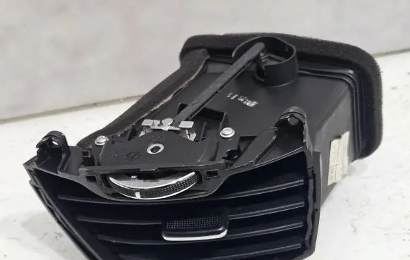 KIA Sportage Dash center air vent grill 974903W000