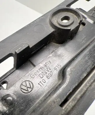 Volkswagen Touran I Front bumper mounting bracket 1T0807935
