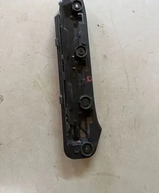 Volkswagen Touran I Front bumper mounting bracket 1T0807935