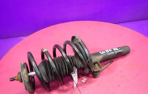 Volkswagen Sharan Front shock absorber with coil spring