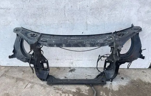 Radiator support slam panel