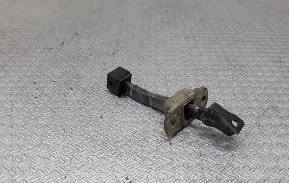 Mitsubishi Lancer Rear door check strap stopper