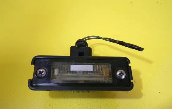 Volkswagen Golf IV Number plate light 1J6943021