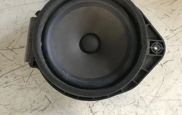 Opel Astra J Front door speaker 13257500