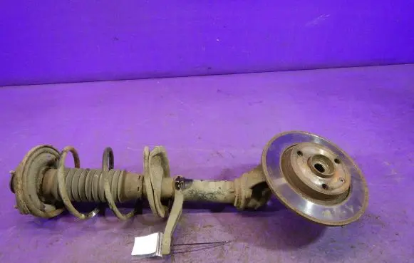 Front shock absorber with coil spring