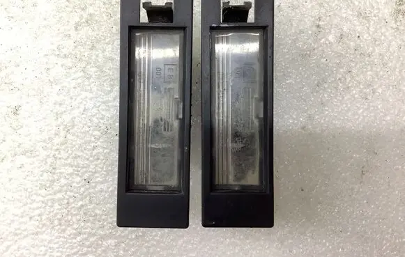 Opel Zafira B Number plate light 57581 OLSA0461200