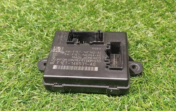 Ford Focus ST Door control unit/module F1ET14F142AC F1ET14C064AG