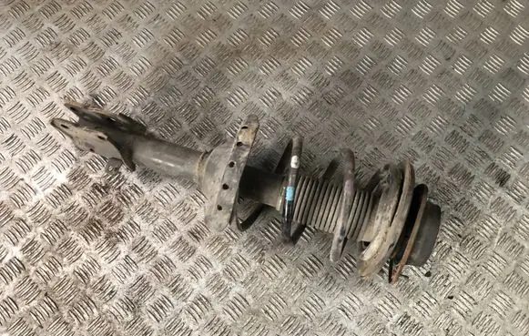 Subaru Legacy Front shock absorber with coil spring