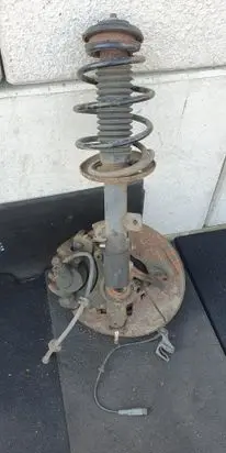 Front wheel hub spindle knuckle