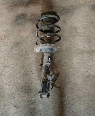 Mitsubishi Outlander Front shock absorber with coil spring