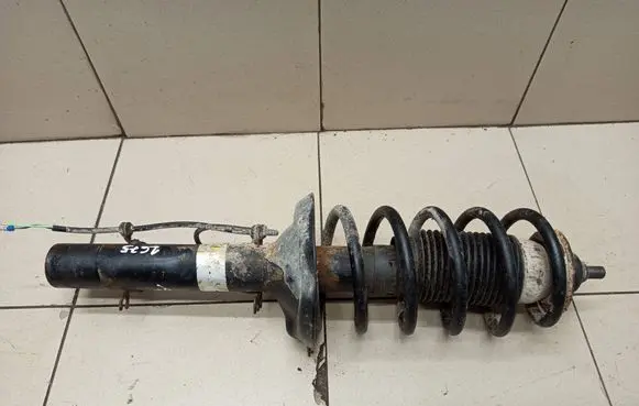 Volkswagen Golf IV Front shock absorber with coil spring