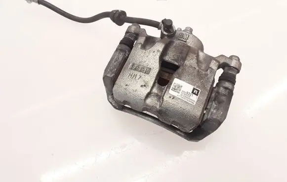 Opel Karl Front brake caliper 42439331 557805026 K7B240096