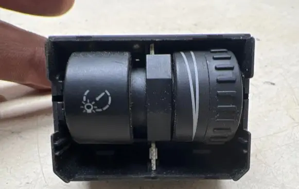 Panel lighting control switch