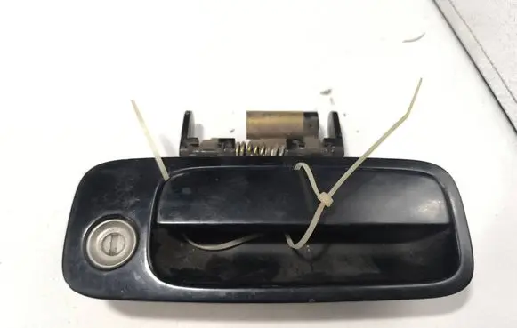 Toyota Camry Front door exterior handle 69210AA010