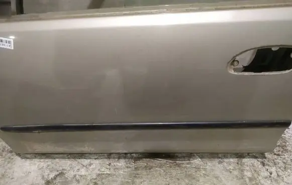 Mazda 323 Front door trim (molding) 